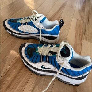 Nike Women's Air Max 98 sneakers in the Blue Nebula/Radiant Emerald colorway.